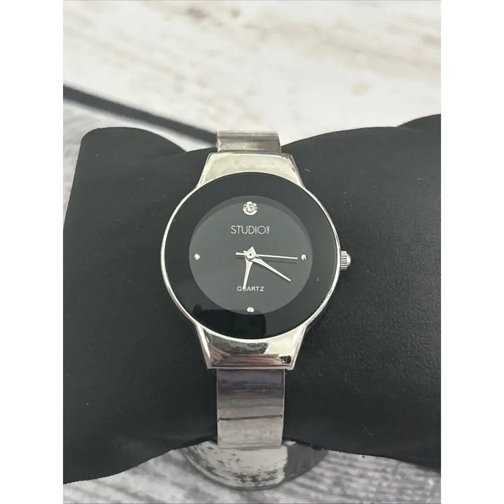 Studio Time Black Dial Silver Case And Band Women’s Cuff Watch